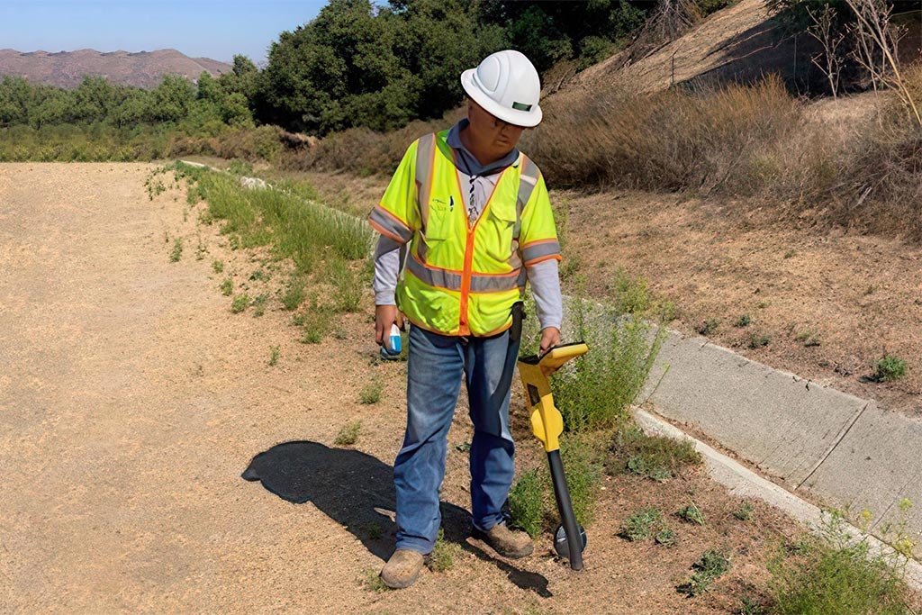 Pic of staff marking pipeline